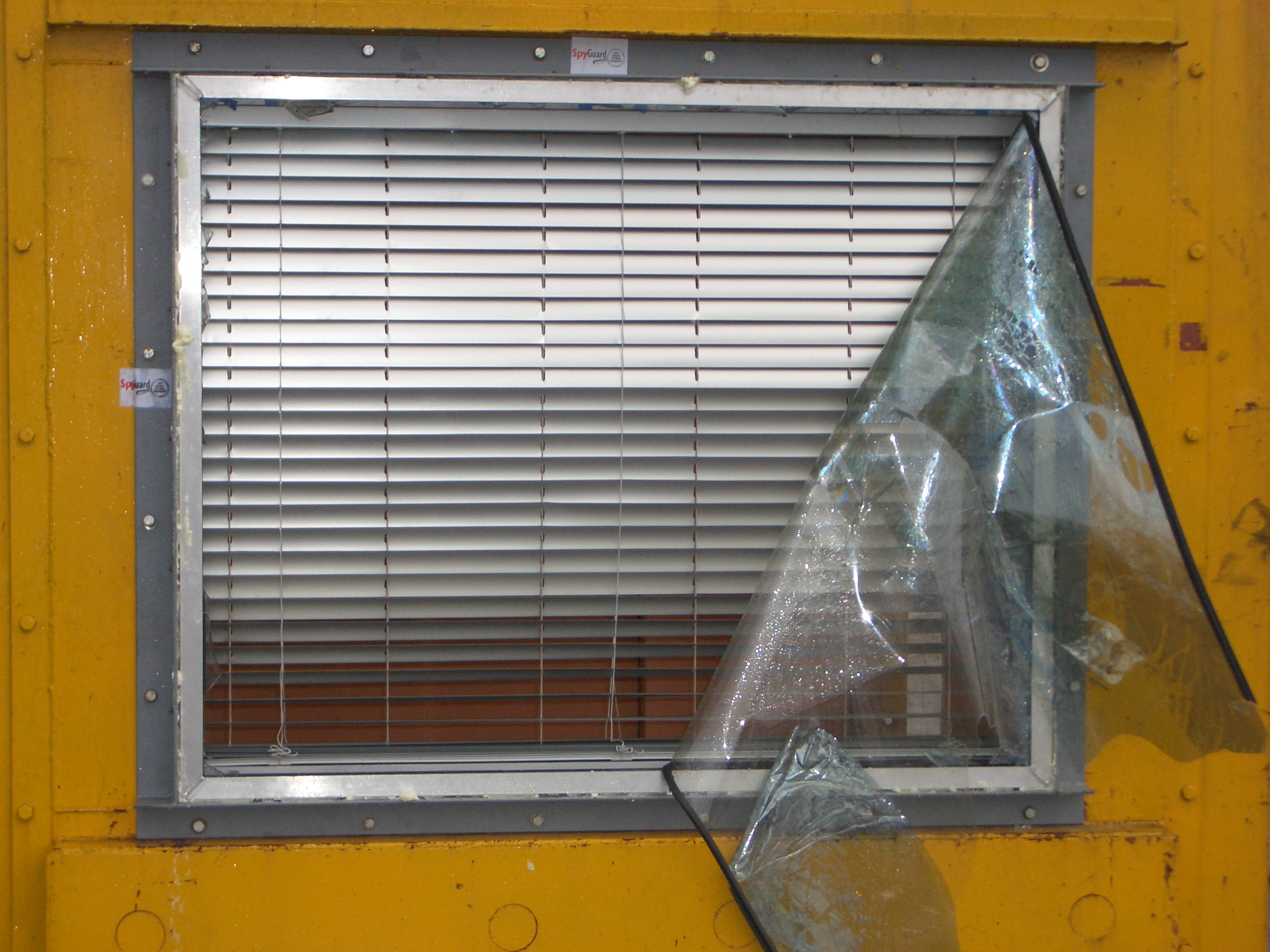 Interior window frame with BlastBlind protection after blast testing